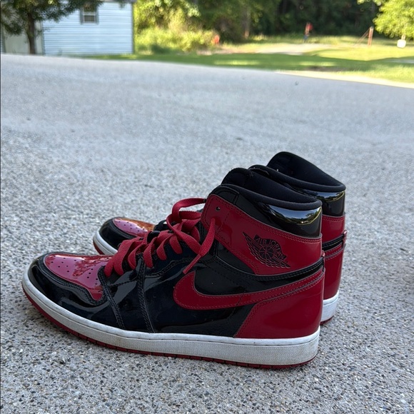 Nike Air Jordan 1 High Black and Red Patent Leather Sneakers